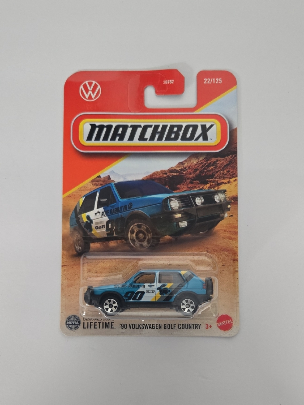 Matchbox Blue and Yellow '90 Volkswagen Golf Country Toy Car